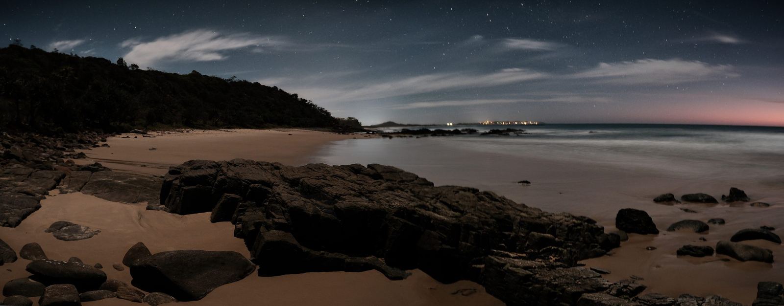 Night panorama, city lights and stars