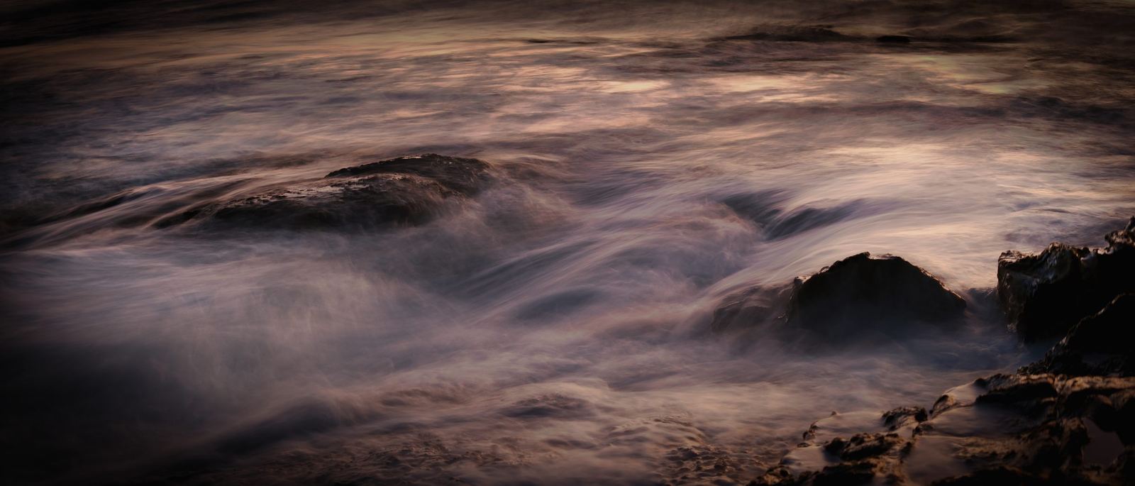 Abstract water over rocks